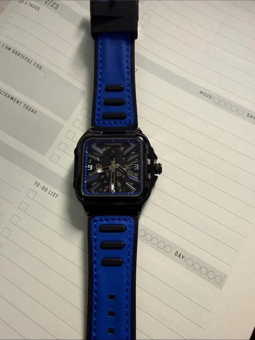 Blue-Accent Skeleton Dial Smartwatch